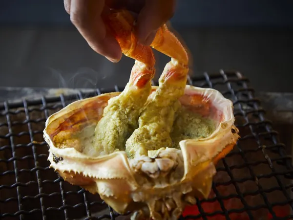 池田紘三の炭火で焼く甲羅焼き